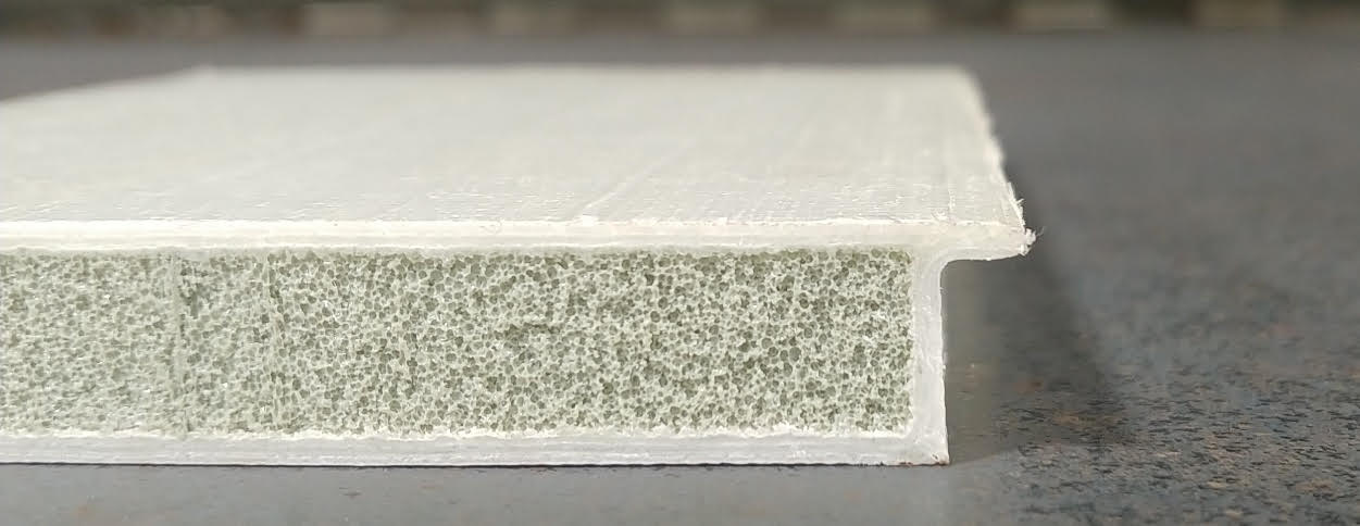 OmneBoard cross-section showing composite face layer and engineered foam core